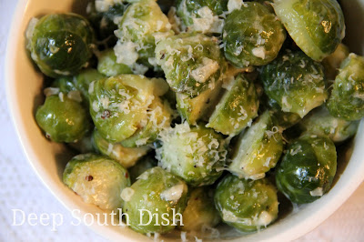 Brussels sprouts, steamed first, then sauteed in butter and cream, and finished with a bit of salt, pepper and Parmesan.