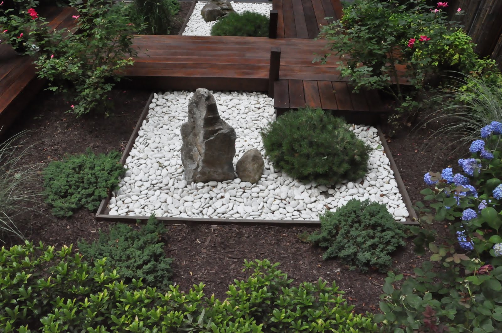 This small rock garden was influenced by Zen meditation gardens.