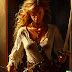 Painting of pirate goddess holding sword at the door…