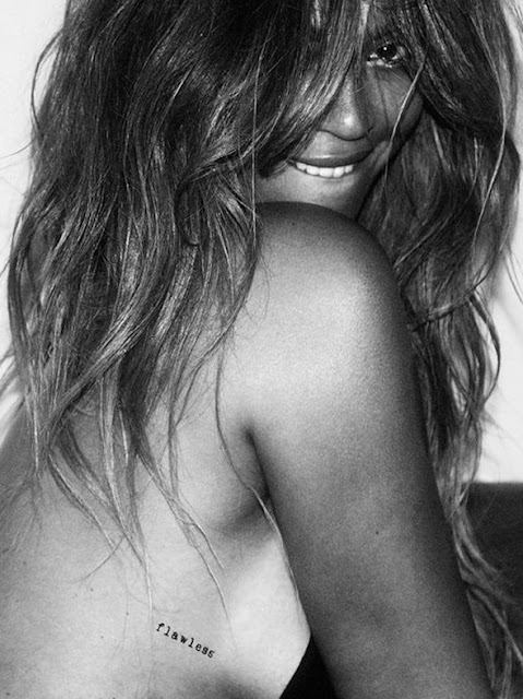 Beyonce flaunts major sideboob as she shares saucy snaps to launch new tattoo collection