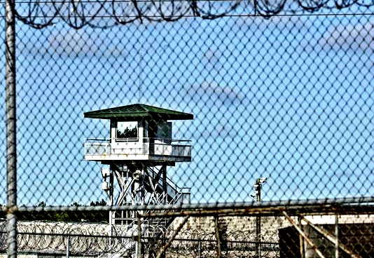Bloodied bodies stacked in a prison yard: What happens when states slash prison spending