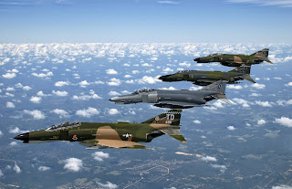 Over FLORIDA—A formation of F-4 Phantom II fighter aircraft fly in formation during a heritage flight demonstration here. The heritage flight program was established in 1997 to commemorate the 50th Anniversary of the U.S. Air Force | MSgt Michael Ammons