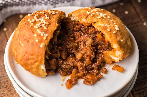 Unsloppy Joes Biscuit Pocket on a white plate.