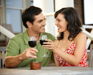 couple toasting; wine