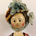 An Early Wooden Doll at Lucy's Doll House