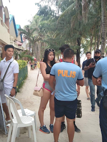 Boracay doesn't specifically prohibit the wearing of very skimpy swimsuits, therefore the tourist was made to pay a fine of 2,500 pesos (S$67) for violating a law that prohibits the taking and display of 'lewd' photographs instead.