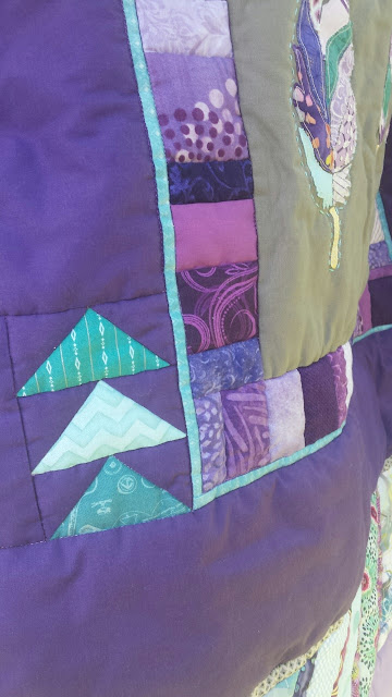 Aqua and purple feather round robin quilt