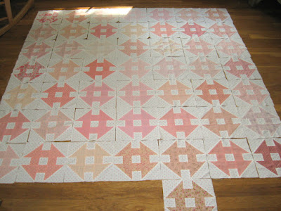 churn dash quilt blocks in coral/peach/blush/melon/etc.