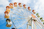 Lots of flirting going on behind the scenes at an amusement park and when . (ferriswheel)