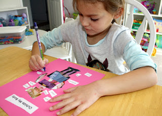 Tessa cut out body parts from various pictures in catalogs and magazines. She glued the pieces onto card stock to create a collage person and then labeled the parts.