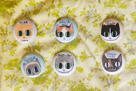 Cat Party magnet collection: six circular magnets, each with a different cat face.