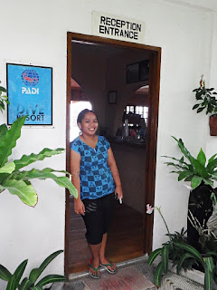 smiling welcoming staff at the door of Sogod Bay Scuba Resort, Padre Burgos, Southern Leyte