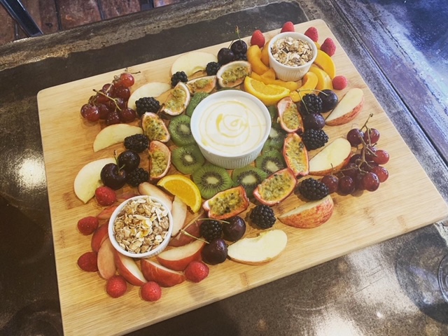 Fruit medley platter board, with Greek yogurt and granola pots