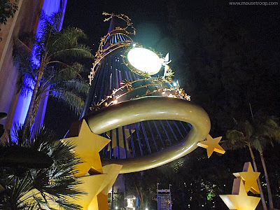 Disneyland Hotel Sorcerer hat entry resort night sparkling TInker