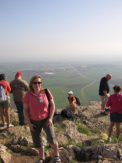 Elke on top of Mount Precipice with the Jezreel Valley below her