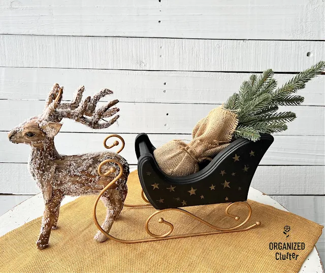 Photo of an upcycled wooden & metal Christmas sleigh decoration.