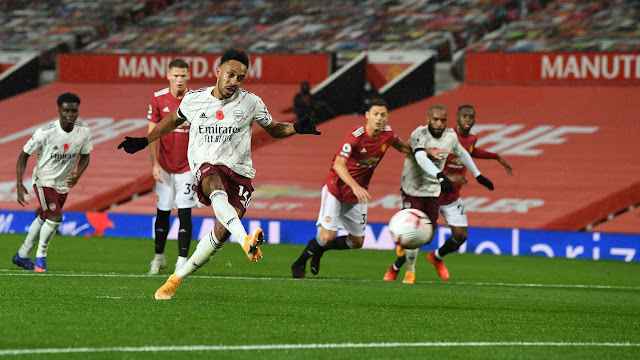 Aubamyeang scoring a penalty against West Brom