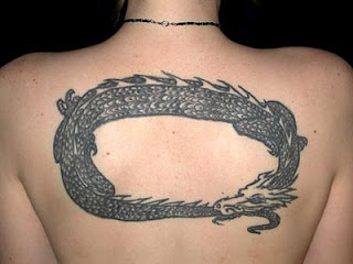 Dragon art tattoo design on girl's back body