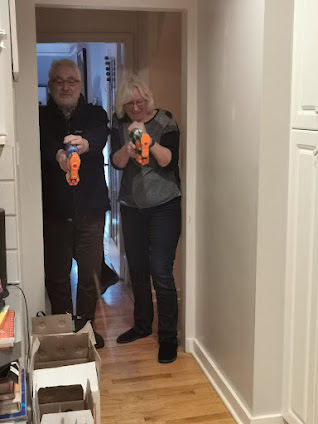 Grandparents firing x-shot toy guns