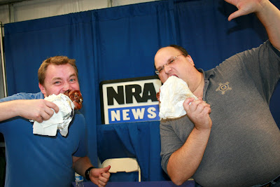 John and Dylan gnawing on smoked turkey legs.