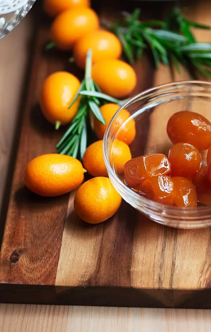 fresh kumquats and candied kumquats