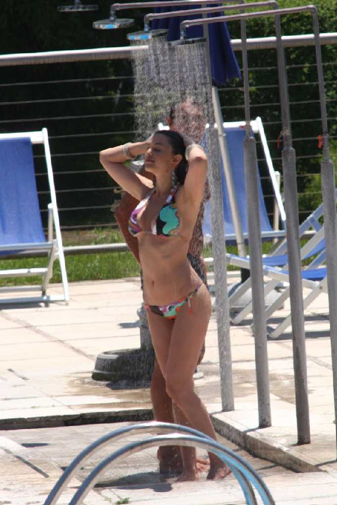 Sara Tommasi hot bikini body and sexy showering candids in Rome