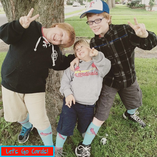 Boys grow but never out of being Cardinal Fans!