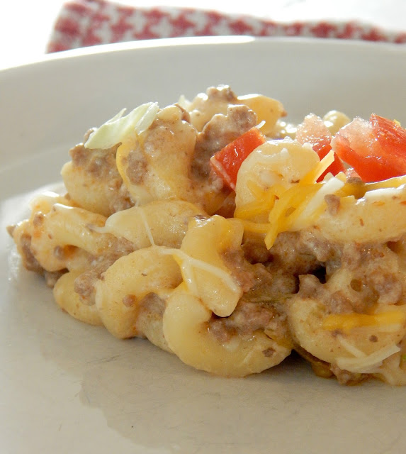 Skillet Taco Mac-n-Cheese...a delicious, family friendly one pot 30-minute meal!  Use your leftover taco meat and combine it with a creamy, rich, cheesy pasta. (sweetandsavoryfood.com)