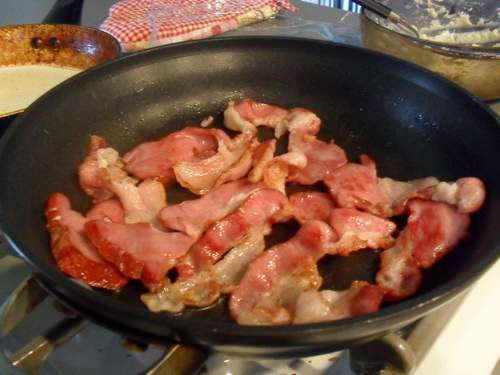 Fried Bacon Ends in a Skillet