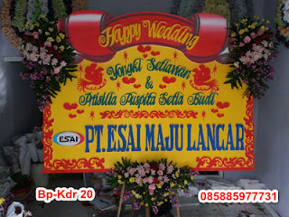 Toko karangan bunga di pare kediri menjual karangan bunga duka cita, belasungkawa, pernikahan atau wedding, selamat dan sukses, serah terima jabatan, promosi doktor, atau congratulation, handbouqet, bunga meja dan standing flower di pare kediri