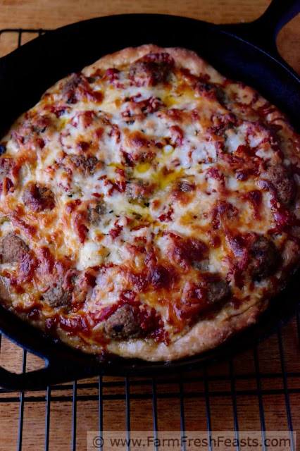 A pizza you can really sink your teeth into--this is filled with meatballs and vegetables sandwiched between two layers of cheese in a hearty deep dish pizza.