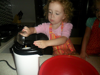 Pouring in the corn kernels