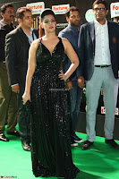 Varalaksmi in Green Glittering Sleeveless Backless Gown at IIFA Utsavam Awards 2017  Day 2  Exclusive 22.JPG