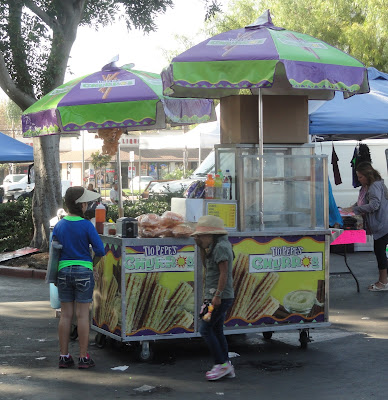 colorful churro stand at a flea market