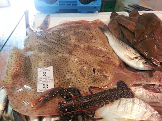 Image of fresh seafood for sale at a market in La Rochelle