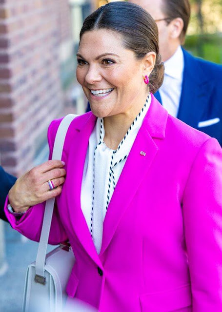 Princess Mette-Marit wore a satin trench coat by Tome, Princess Victoria wore a satin blouse by Peter Pilotto, and pink suit