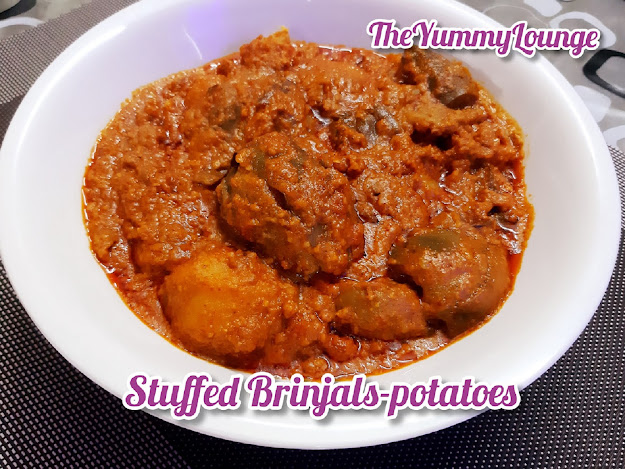 This is gujarat's popular Stuffed Brinjal Potato | Bharela Ringana Bateta Spicy Indian Curry Recipe.