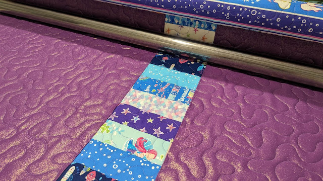 Meander quilting on a longarm