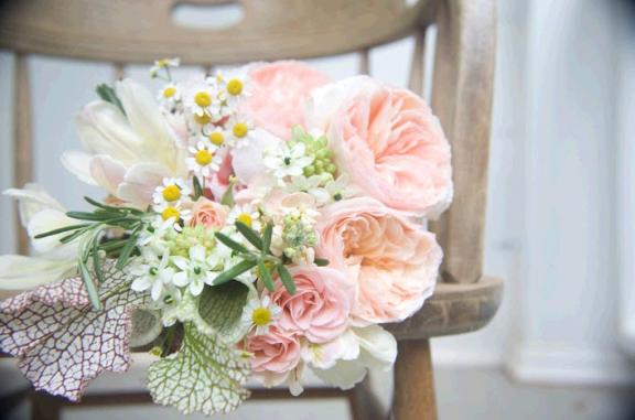 The newest look in wedding floral arrangements is vintage romantic with 