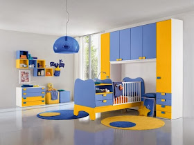 Cuarto de bebé color amarillo azul