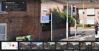 Google Streetview showing the blue sign in the text in the main post.