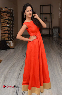 Telugu Actress Divya Nandini Stills in Orange Sleeveless Gown at Chennai Chaitrama Movie le Launch Event  0124.JPG