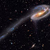   The Epic Cosmic Collision That Sparked Star Formation and Created a 280,000-Light-Year Tidal Tail 