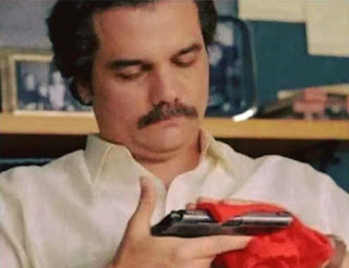 NARCOS PABLO ESCOBAR CLEANING PHONE