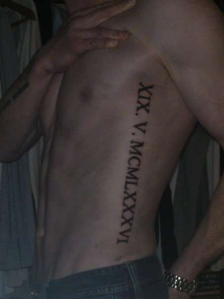 roman numeral tattoo designs. 2010 and roman numeral tattoo.