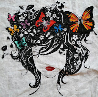 Woman with butterflies cross stitch kit