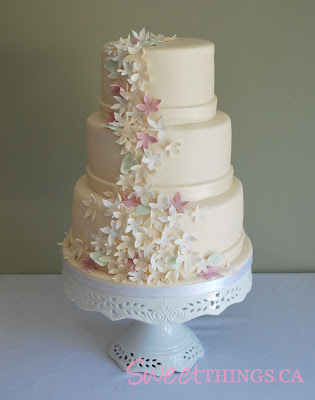 simple wedding cakes with flowers. This wedding took place at a