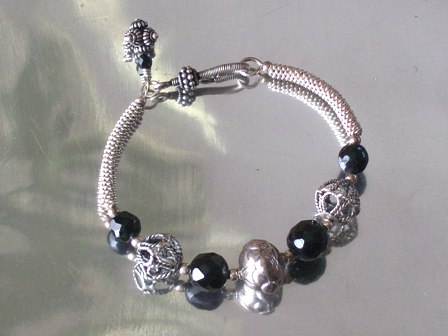 bali silver beads. Black faceted and ali silver