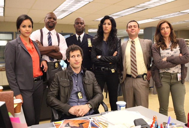 BROOKLYN NINE-NINE: From Emmy Award-winning writer/producers of &quot;Parks and Recreation&quot; and starring Emmy Award winners Andy Samberg (third from L) and Andre Braugher (C), BROOKLYN NINE-NINE is a new single-camera workplace comedy about what happens when a hotshot detective (Samberg) gets a new Captain (Braugher) with a lot to prove. The new single-camera workplace comedy BROOKLYN NINE-NINE premieres this fall on FOX. Also pictured L-R: Melissa Fumero, Terry Crews, Stephanie Beatriz, Joe Lo Truglio and Chelsea Peretti. &#xa9;2013 Fox Broadcasting Co. Cr: Beth Dubber/FOX