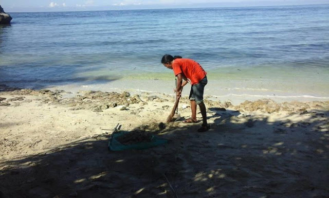 pemuda bersihkan pantai dato